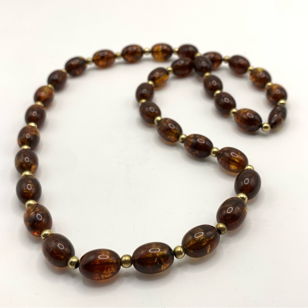 Avon Goldtone and root beer Brown Necklace with oval Beads